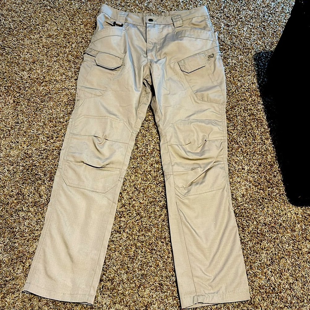 Tan Tactical pant.  Size Medium.  Stretch waist 30-32.  Inseam 28